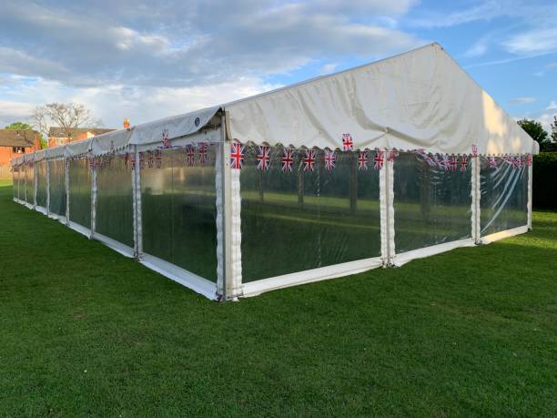 istock Long white empty tent in a public park 1731947665