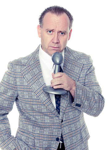 A retro-processed news anchorman against a white background.