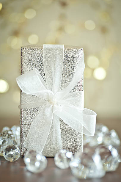 istock Christmas gift wrapped with bow, close-up 173195775