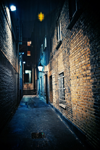 dark alley, rainy night.