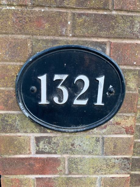 istock House number 1321 attached to a brick pillar 1731961549