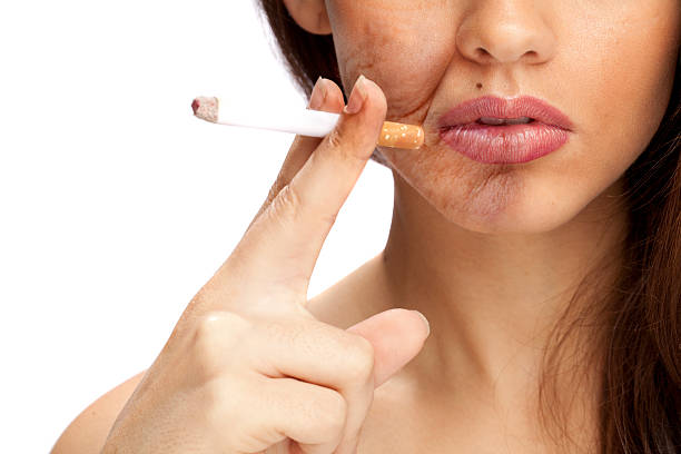 The effects of smoking (Area on Face is Aged) The effects of smoking (Area on Face is Aged) smokers wrinkles stock pictures, royalty-free photos & images