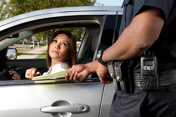 istock Police Officer giving a ticket 173198024