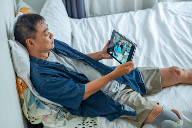 istock Disabled man talking to doctor on video call 1732006397