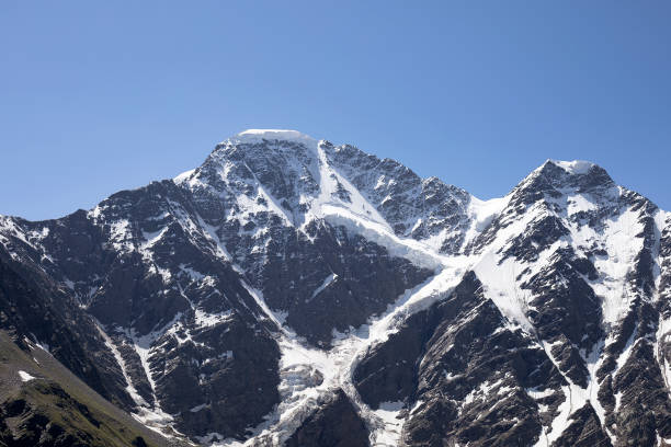 istock snowy mountains on a sunny day 1732011832