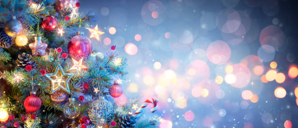 istock Christmas Tree With Ornaments In Blue Abstract Background 1732018499