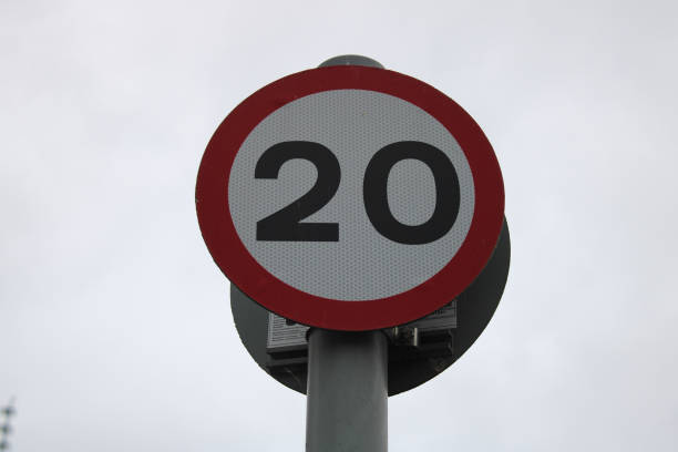 istock 20 MPH speed limit sign, cloudy sky background 1732023835