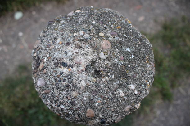 Elevated view of concrete bollard up close