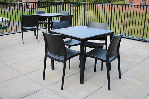Outdoor seats and table, black plastic seats and table