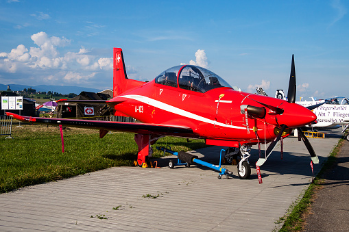 Payerne, Switzerland - September 7, 2014: Military trainer plane at air base. Air force flight operation. Aviation and aircraft. Air defense. Military industry. Fly and flying.