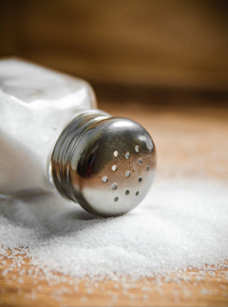 istock Salt background . On wooden table. 1732041098