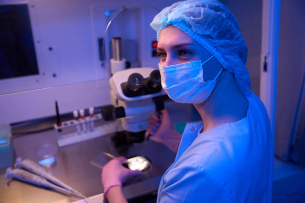 istock Experienced female scientist collecting cell samples from multi-well plate 1732047987