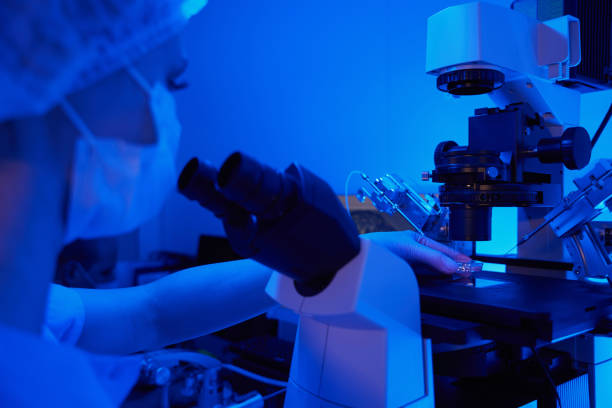 istock Experienced embryologist preparing for conducting ICSI procedure with micromanipulator 1732049678