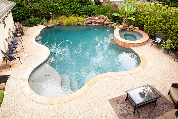 istock Birds eye view of swimming pool in back yard 173205240