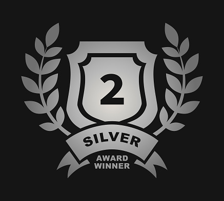 Stylized award winner badge with number 2 on shield, laurel branches and ribbon with SILVER lettering - cut out vector icon, silver colored on black background.
