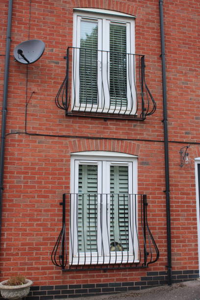 istock House with patio windows with metal grate barrier to prevent falls 1732077039