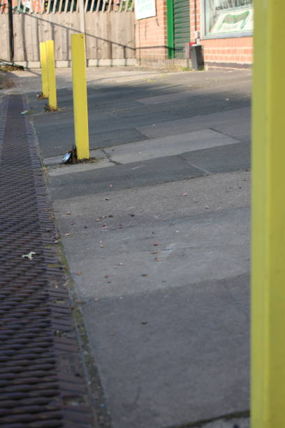 istock Yellow metal bollards outside public shops 1732091440