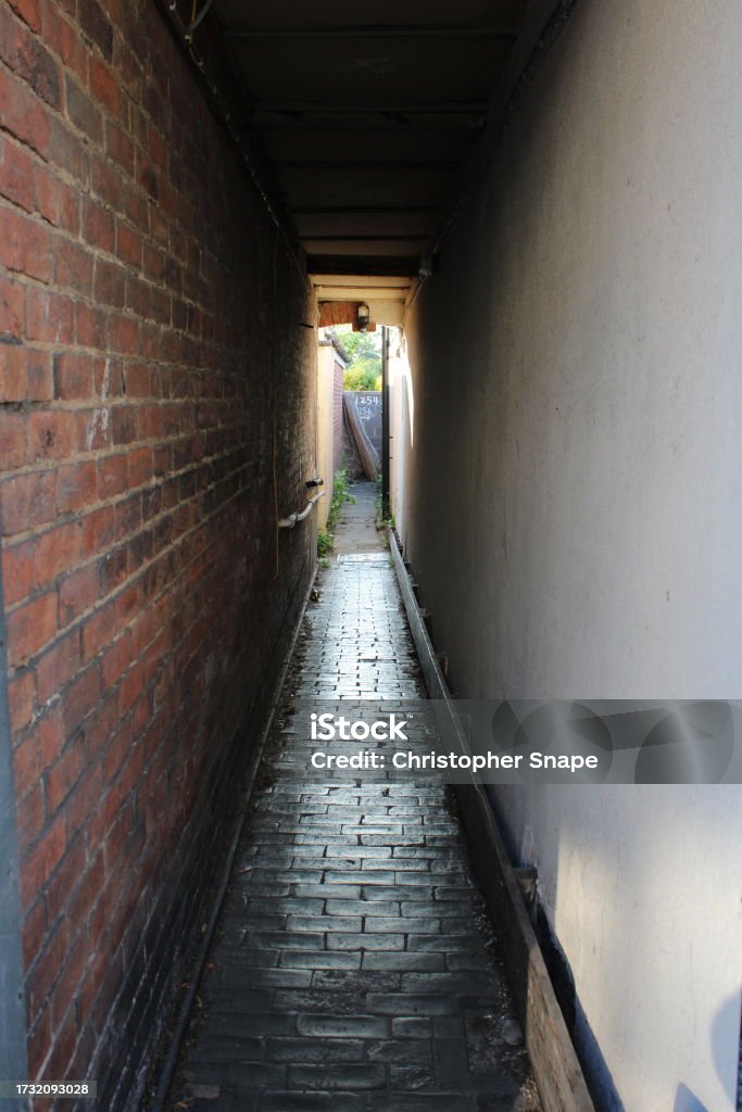Diminished Alley Dark Alleyway Tunnel Leading To Rear Access For Flats Stock Photo ...