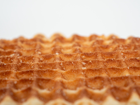 Belgian waffles isolated on white background. Belgian waffles close up.