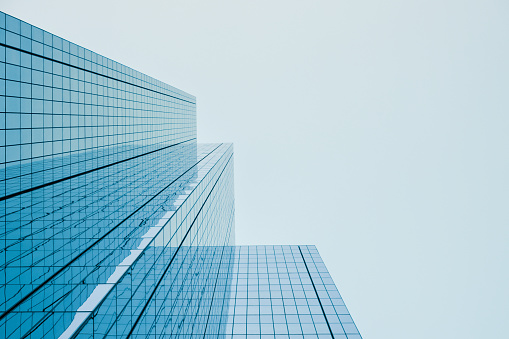 Glass windows of skyscrapers, texture. Matte surface not reflecting the sky. Texture