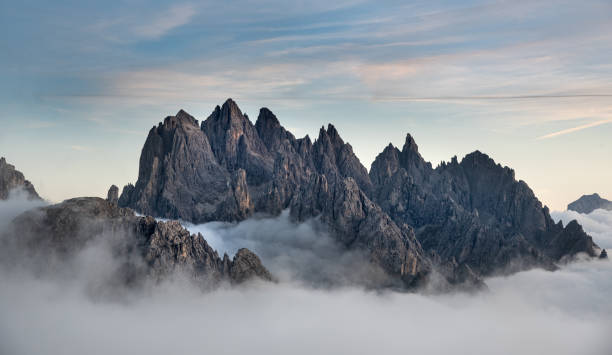 istock Mountain landscape with fog, at sunset Dolomites Italy 1732178272