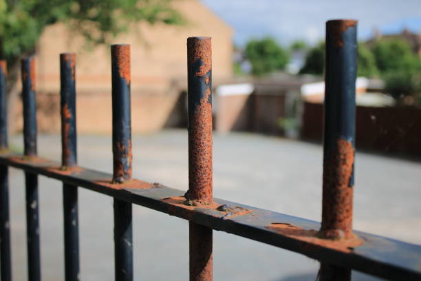 istock Old rusted black metal railing fence 1732182865