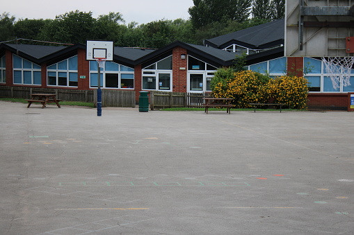 School playground with basketball hoops UK
