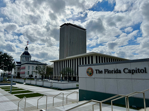 The Florida State Building is located in Tallahassee, the capital of Florida.\nBlue sky with many clouds.