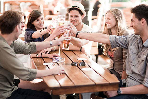 istock Young people drinking beer outdoors 173223757