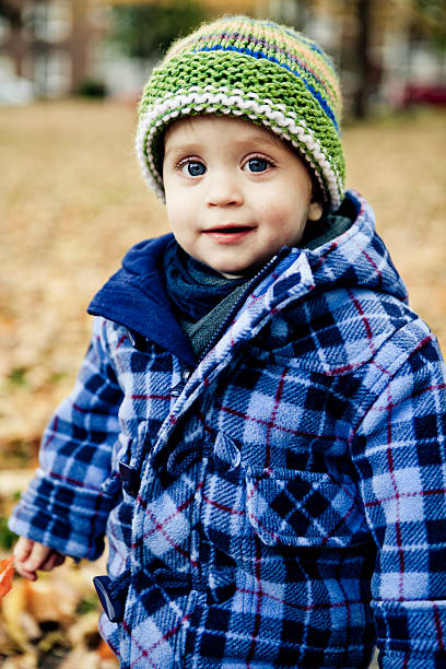 istock Little Boy In Autumn Park 173224127
