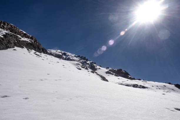 istock Bright sunshine illuminates the snow 1732243317