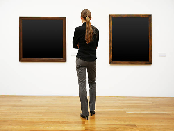 istock woman in a gallery (clipping path) 173226035