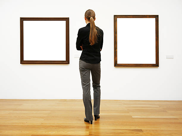 istock woman in a gallery (clipping path) 173226037