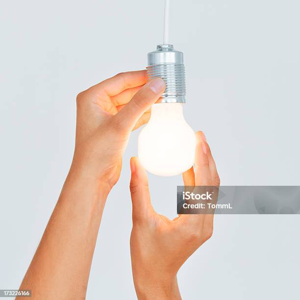 Changing Light Bulb Stock Photo - Download Image Now - Light Bulb, Changing Lightbulb, Electric Lamp