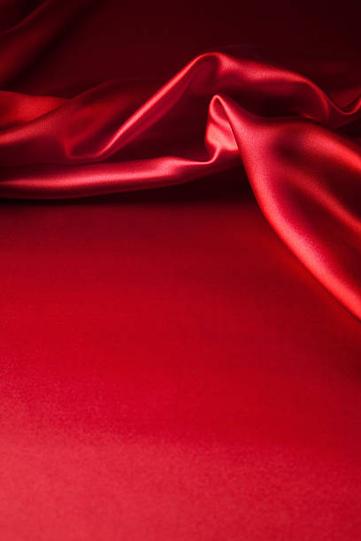 istock Red silk fabric bunched together at the top 173228008