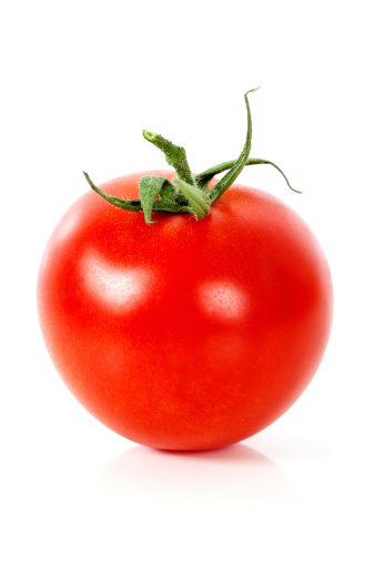 Fresh red  tomato on white background