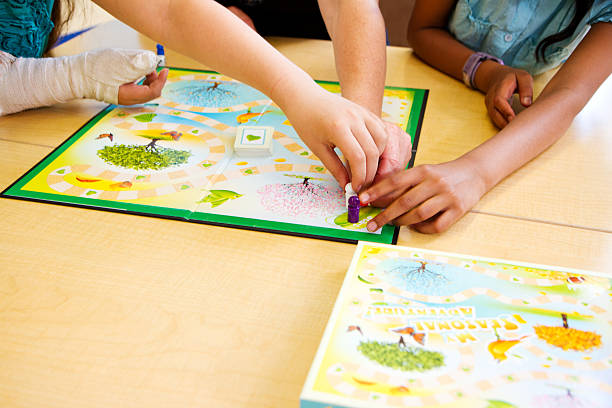 istock Children Playing A Board Game Together 173228265