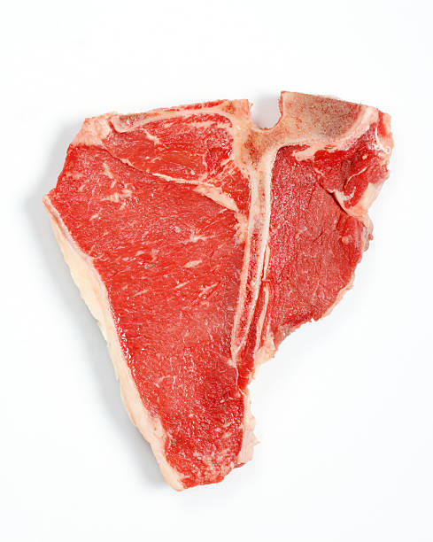 Raw T-Bone Steak Isolated On White stock photo