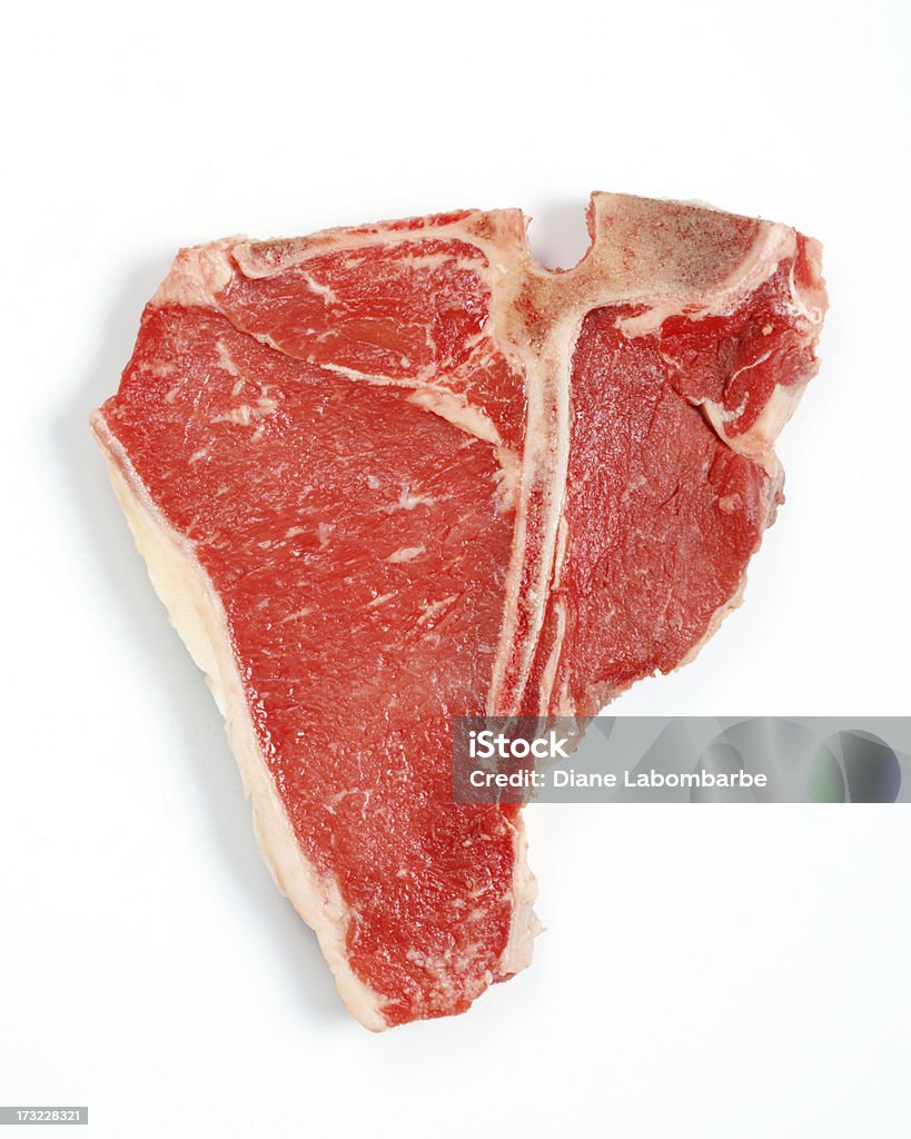 Surowe Stek T-Bone na białym tle - Zbiór zdjęć royalty-free (Stek z kością)