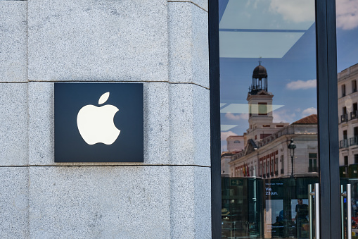 Apple logo from the exterior of the Puerta del Sol store in Madrid Spain