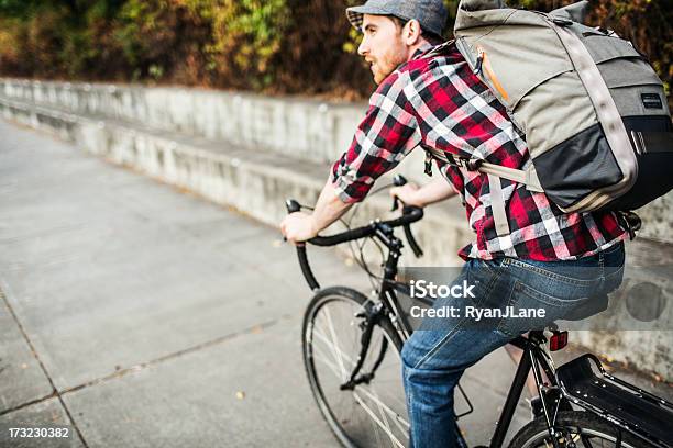 Bike Commuter In Portland Oregon Stock Photo - Download Image Now - Bicycle, Unusual Angle, 20-29 Years