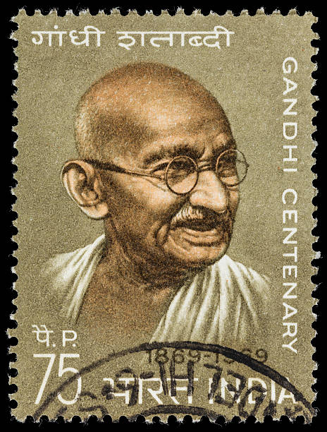 India Mahatma Gandhi centenary postage stamp 1969 India postage stamp with an illustration of Mahatma Gandhi, issued to commemorate the 100th anniversary of his birth. postage stamp photos stock pictures, royalty-free photos & images