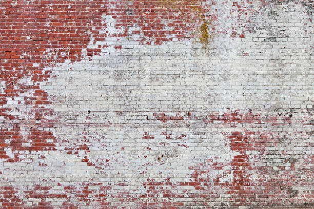 кирпичная стены фон - textured textured effect graffiti paint стоковые фото и изображения