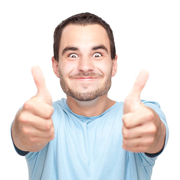 istock Happy young man with thumbs up. 173233589