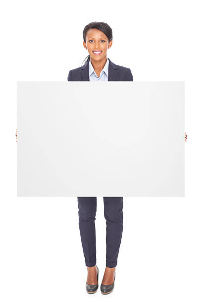 donna d'affari tenendo vuota tabellone - businesswoman advertise placard advertisement foto e immagini stock