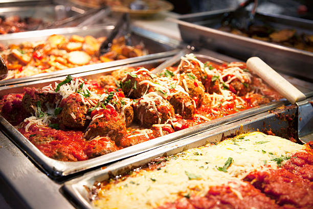 meatballs pasta tomato sauce cheese catering stock photo