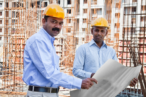 engineer and architect on cconstruction site in Poone, India