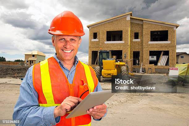 Housing Development And Computer Stock Photo - Download Image Now - Construction Industry, Construction Site, Engineer