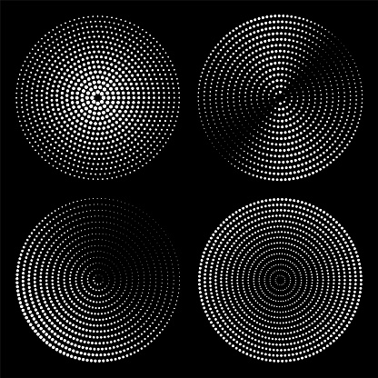 Set of dotted circles. Round vector elements for design. Halftone effect. White circles on a black background.