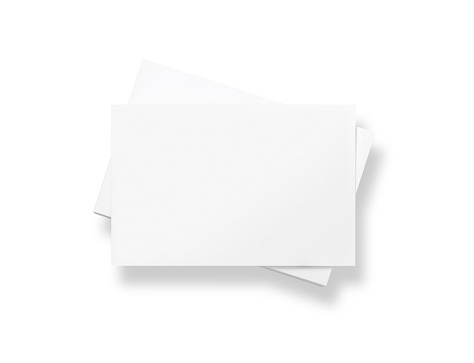 Stack of blank white business cards, isolated on white.